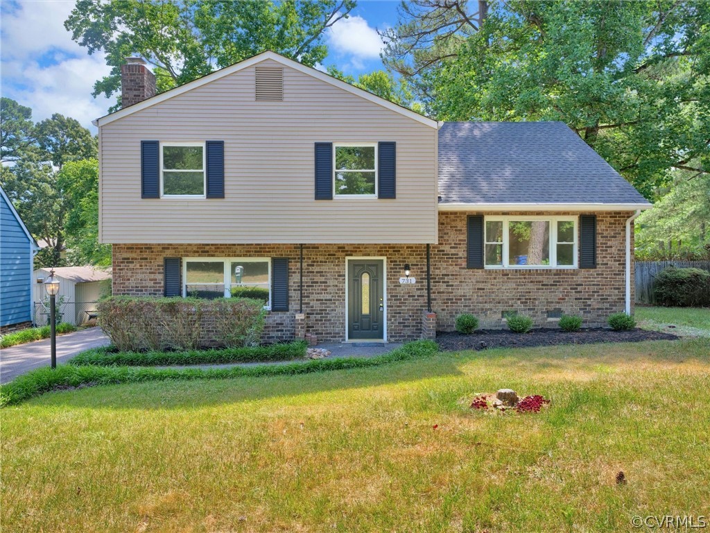 731 Adkins Road Chesterfield, VA 23236 - Photo 2 of 37 a view of a house with a yard