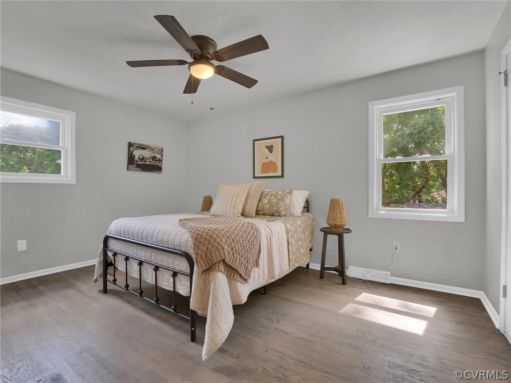 731 Adkins Road Chesterfield, VA 23236 - Photo 27 of 37 a spacious bedroom with a bed and a window