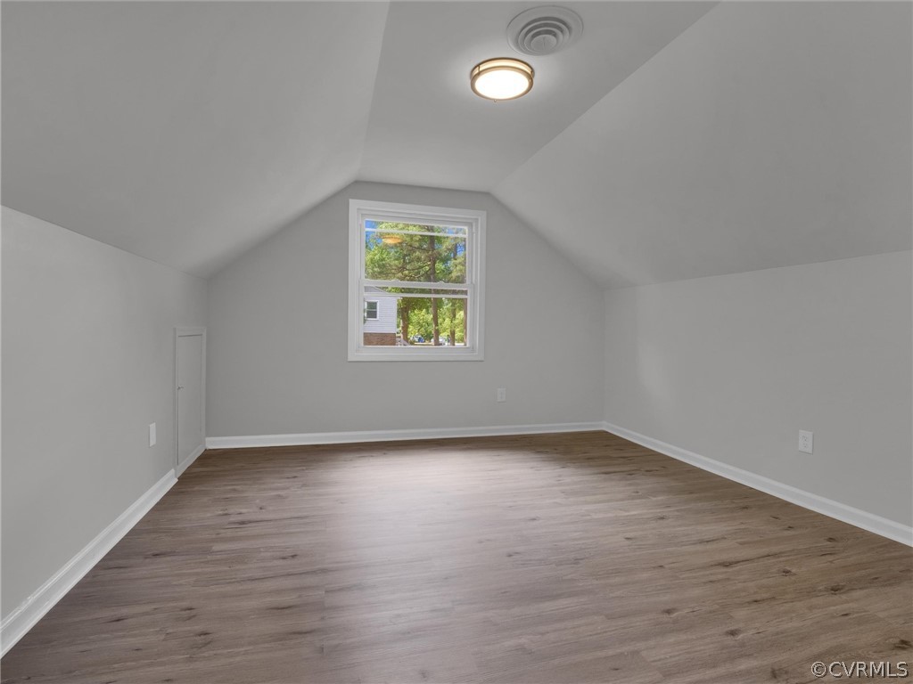 731 Adkins Road Chesterfield, VA 23236 - Photo 28 of 37 an empty room with wooden floor and windows
