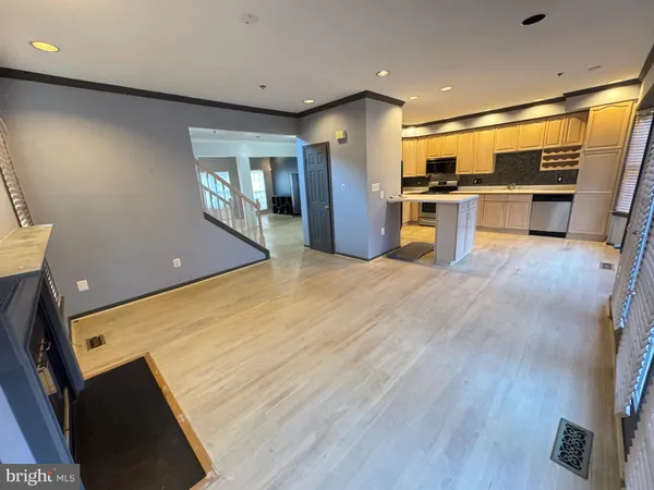 a view of a kitchen with a sink