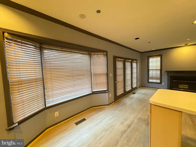 a view of livingroom with furniture and window