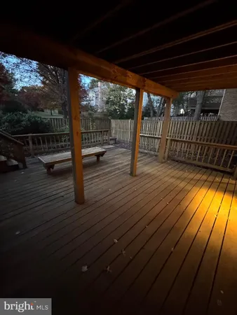 a view of porch with wooden floor