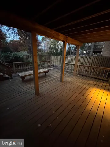a view of porch with wooden floor