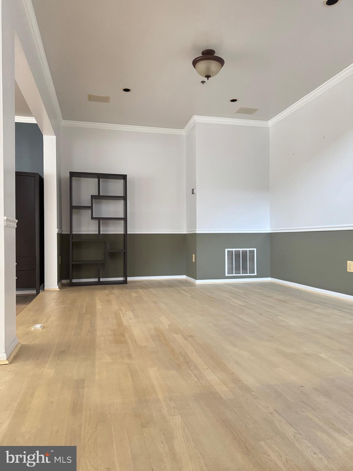 1713 Leighton Wood Lane Silver Spring, MD 20910 - Photo 6 of 47 a view of empty room with windows
