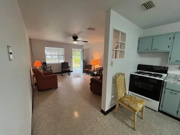a living room with furniture and a couch