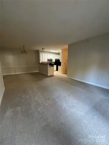 a view of a room with workspace and window