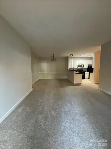 a view of a livingroom and a chair