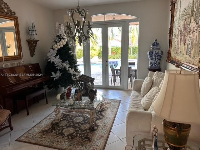 10601 Southwest 128th Street Miami, FL 33176 - Photo 11 of 30 a living room with furniture large window and wooden floor