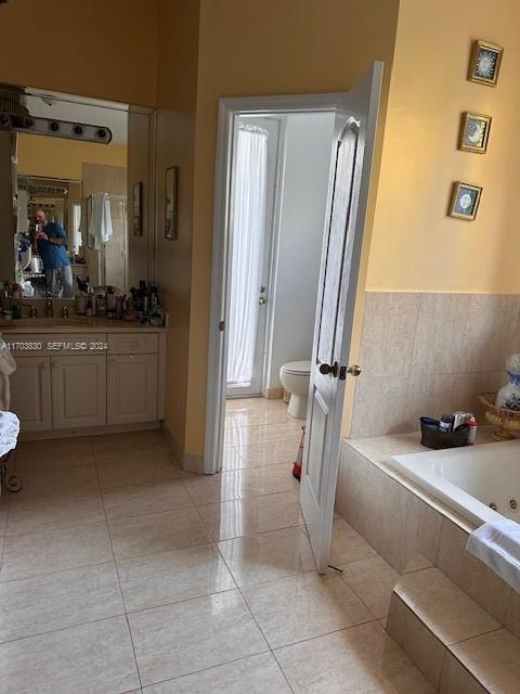 10601 Southwest 128th Street Miami, FL 33176 - Photo 26 of 30 a bathroom with a sink a toilet and a mirror