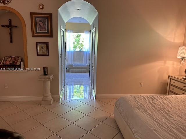 10601 Southwest 128th Street Miami, FL 33176 - Photo 30 of 30 a bedroom with a bed and a window