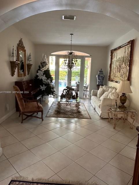 10601 Southwest 128th Street Miami, FL 33176 - Photo 10 of 30 a living room with furniture and a large window