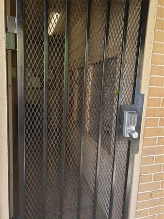 a view of empty room with windows