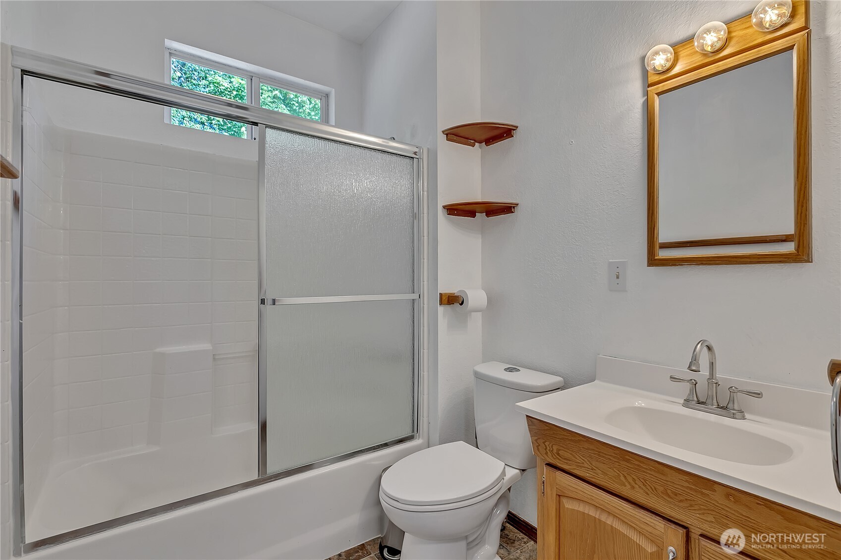 3253 Southeast Arcadia Road Shelton, WA 98584 - Photo 17 of 39 a bathroom with a granite countertop sink toilet and shower