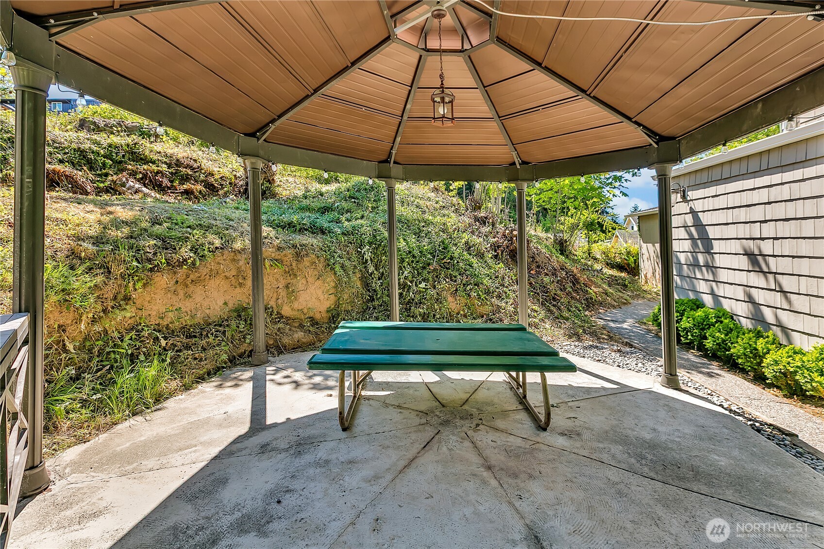 3253 Southeast Arcadia Road Shelton, WA 98584 - Photo 26 of 39 a wooden bench sitting in front of a building