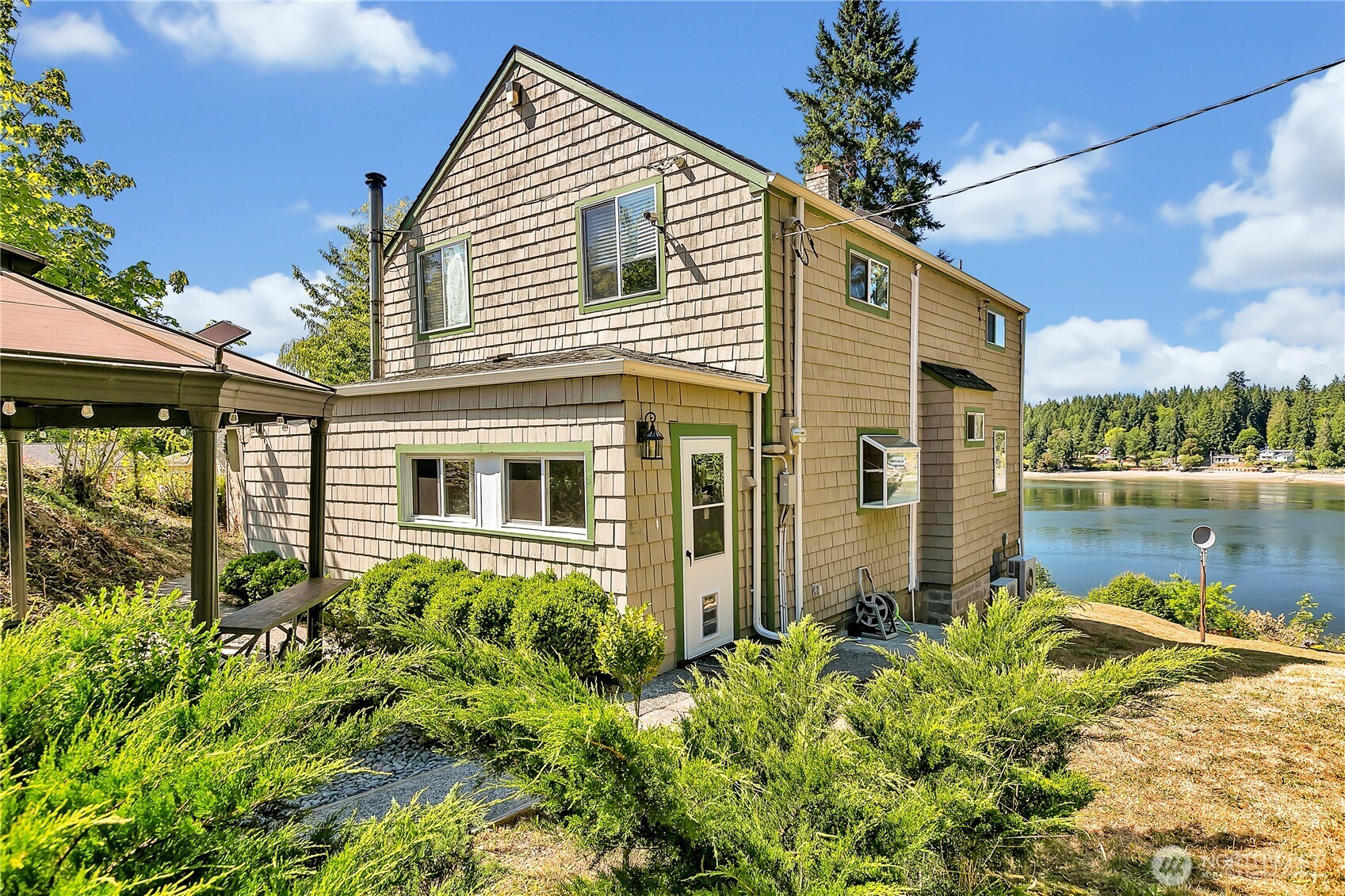 3253 Southeast Arcadia Road Shelton, WA 98584 - Photo 3 of 39 a view of a house with a yard