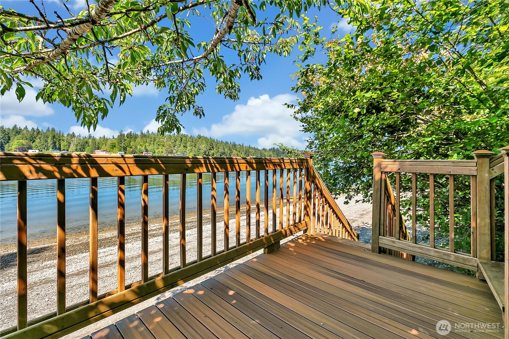 3253 Southeast Arcadia Road Shelton, WA 98584 - Photo 31 of 39 a view of a balcony with wooden floor and plants