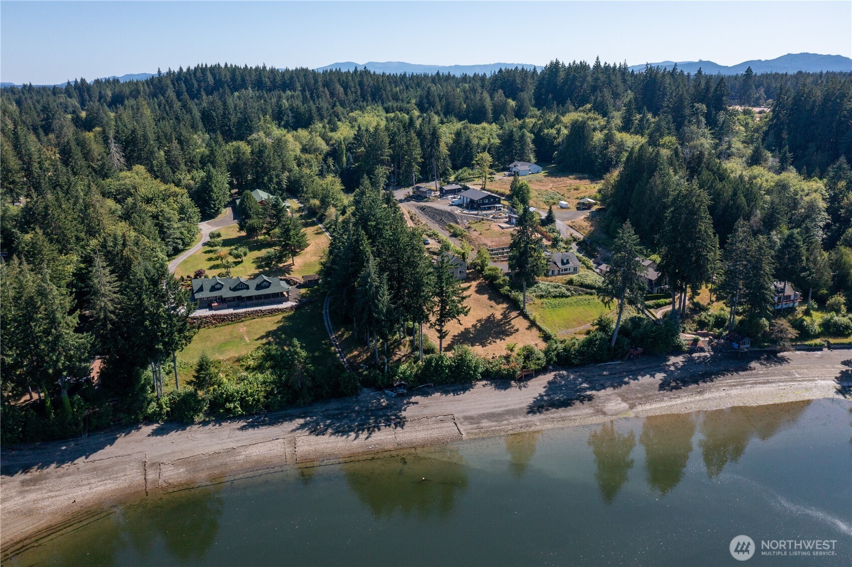 3253 Southeast Arcadia Road Shelton, WA 98584 - Photo 33 of 39 a view of a lake with a yard