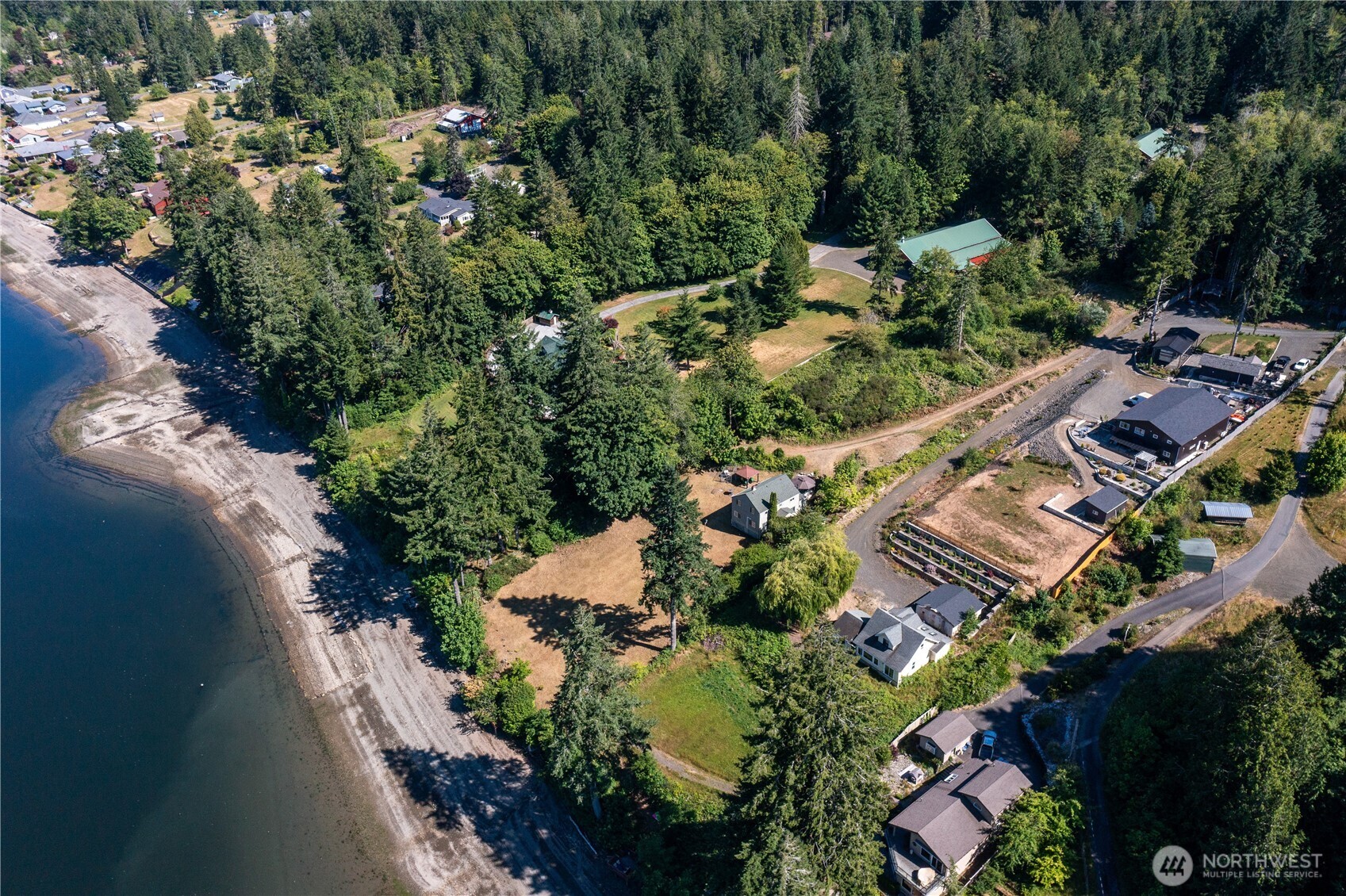 3253 Southeast Arcadia Road Shelton, WA 98584 - Photo 35 of 39 an aerial view of a house with a yard