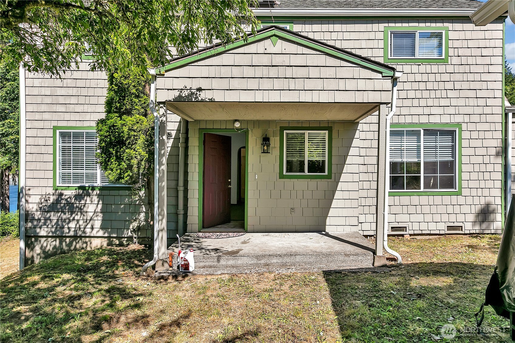 3253 Southeast Arcadia Road Shelton, WA 98584 - Photo 4 of 39 a front view of a house with garden