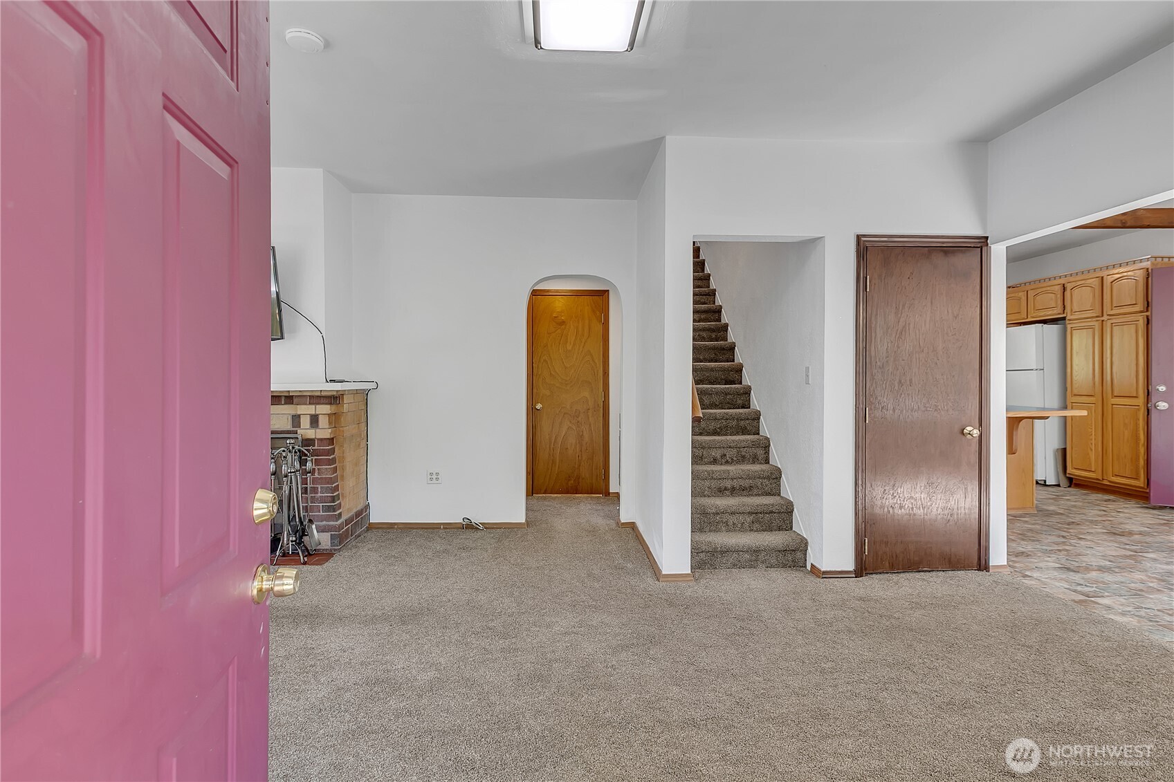 3253 Southeast Arcadia Road Shelton, WA 98584 - Photo 5 of 39 an empty room with a hallway and stairs
