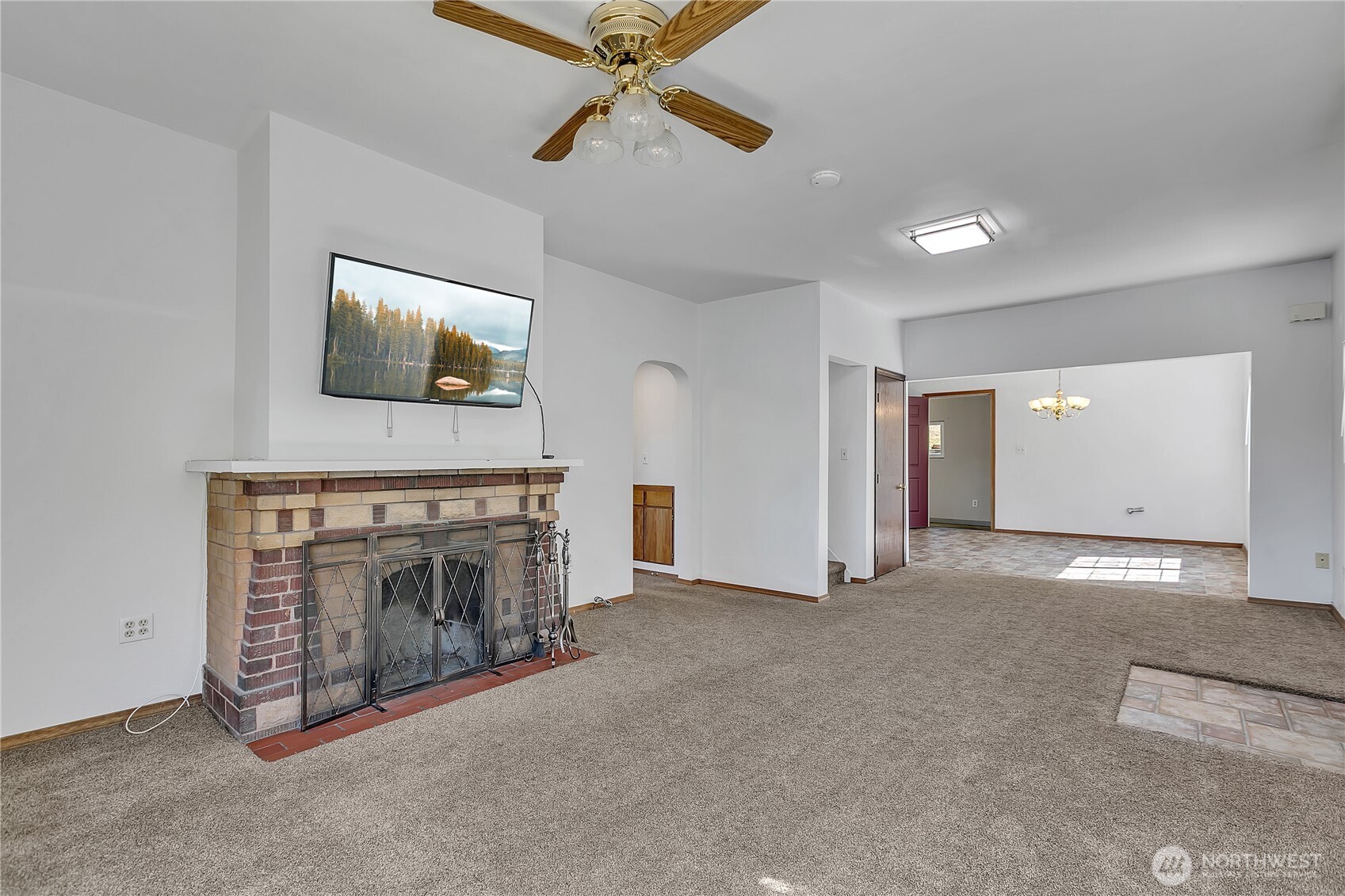 3253 Southeast Arcadia Road Shelton, WA 98584 - Photo 7 of 39 a view of an empty room with a fireplace