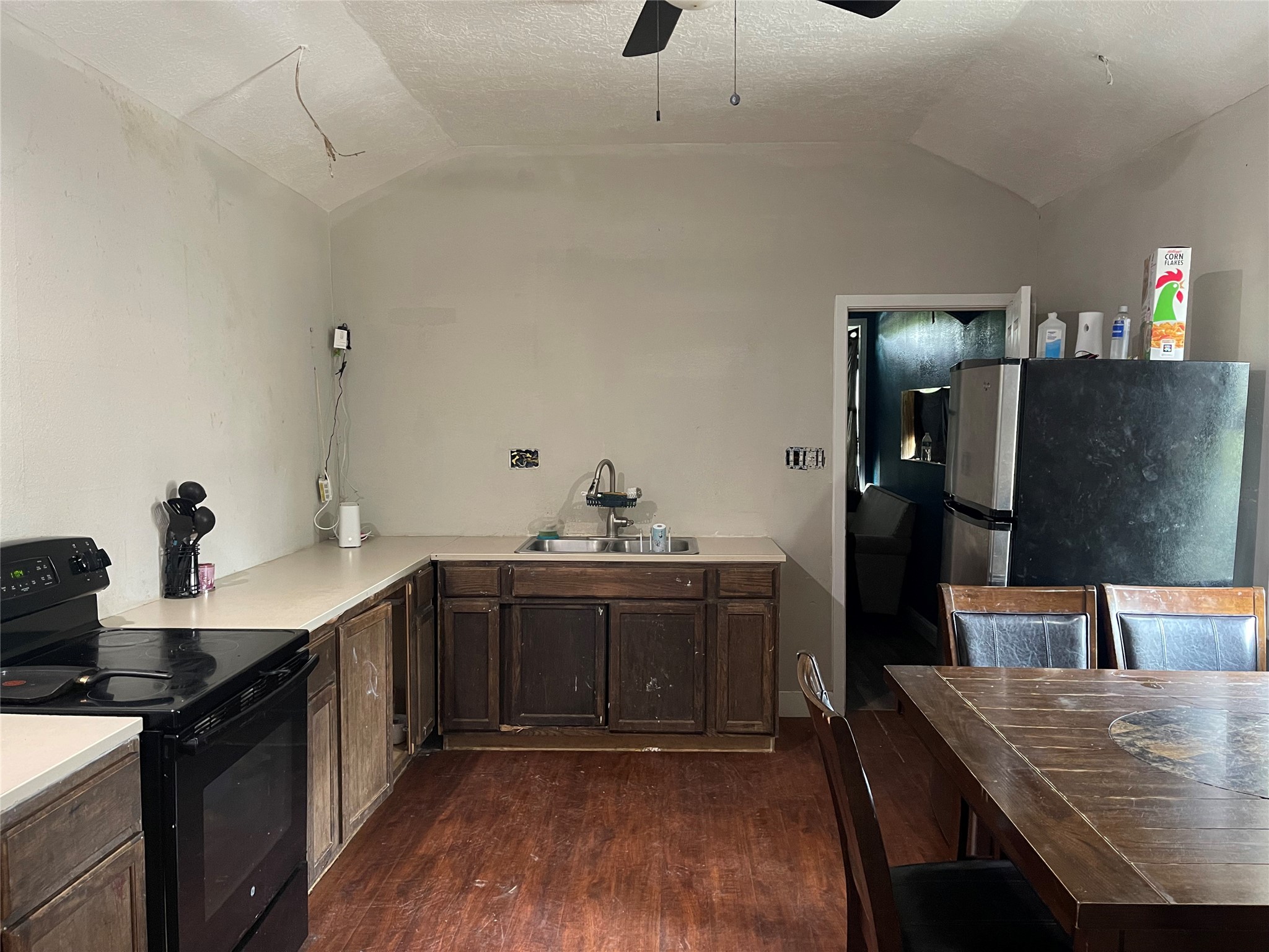 182 Road 5101 Cleveland, TX 77327 - Photo 13 of 35 a kitchen with a sink cabinets and wooden floor