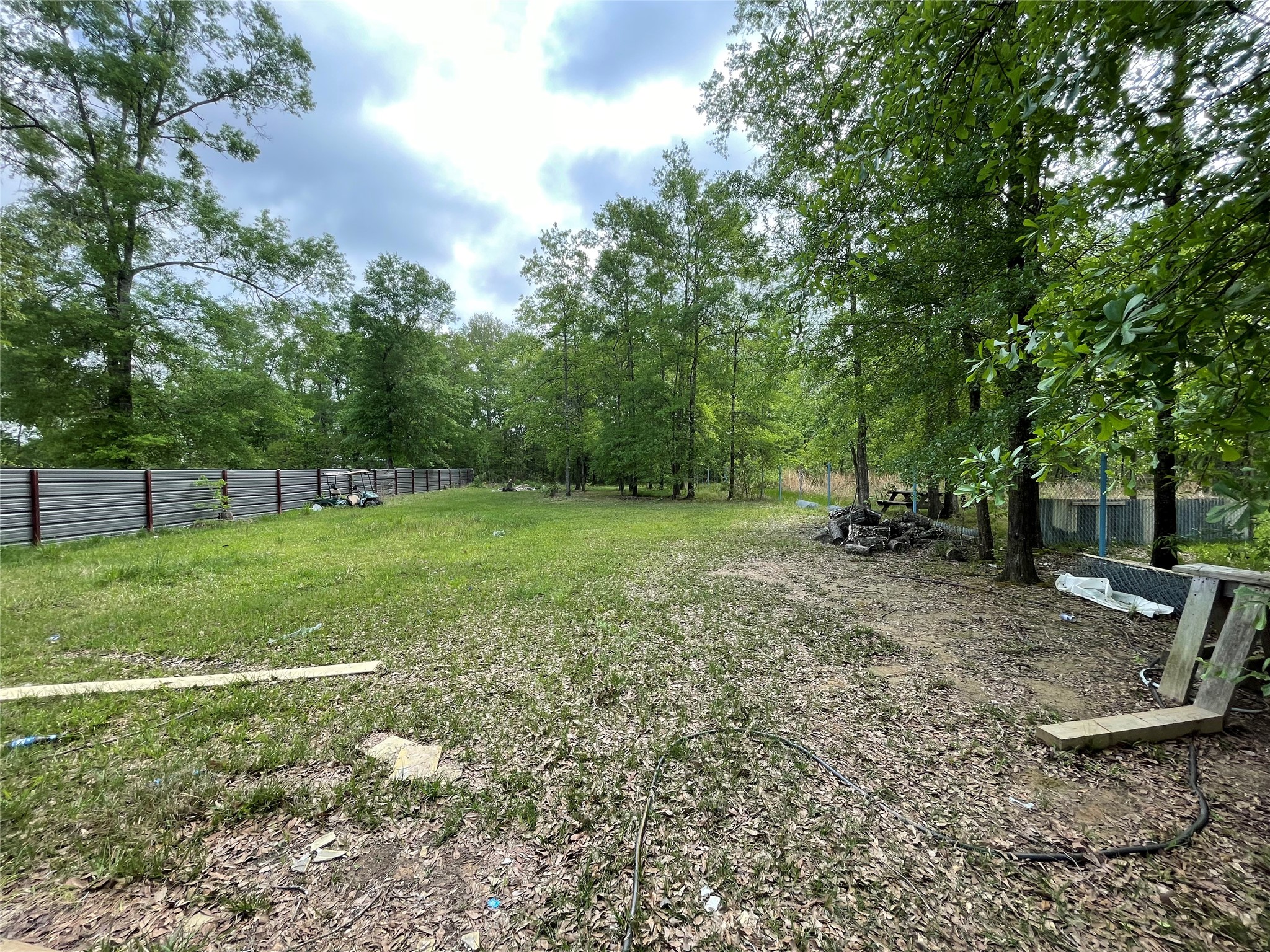 182 Road 5101 Cleveland, TX 77327 - Photo 26 of 35 a view of a yard with a tree