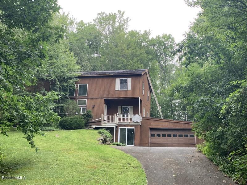 12 Quiet Knoll Road Stockbridge, MA 01266 - Photo 2 of 37 a view of a house with a yard balcony and furniture