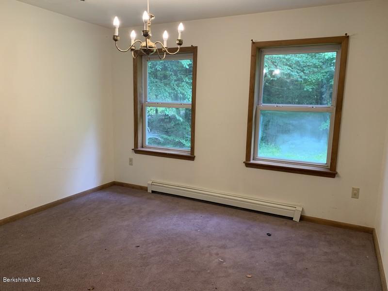 12 Quiet Knoll Road Stockbridge, MA 01266 - Photo 14 of 37 a view of an empty room with a window