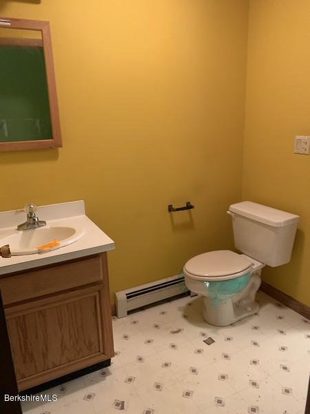 12 Quiet Knoll Road Stockbridge, MA 01266 - Photo 16 of 37 a bathroom with a sink and a toilet