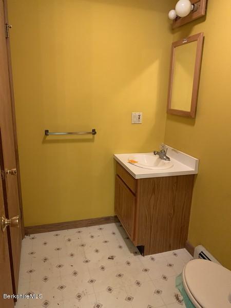 12 Quiet Knoll Road Stockbridge, MA 01266 - Photo 20 of 37 a bathroom with a sink toilet and shower