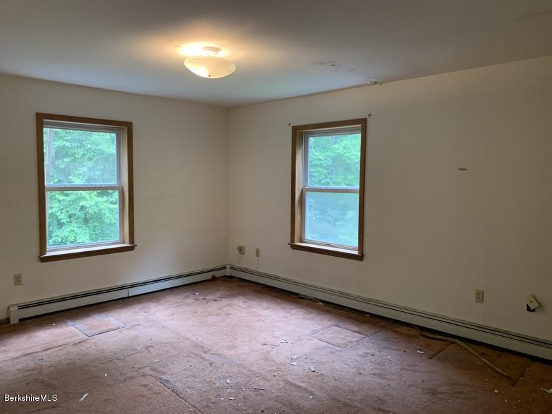 12 Quiet Knoll Road Stockbridge, MA 01266 - Photo 24 of 37 an empty room with a window