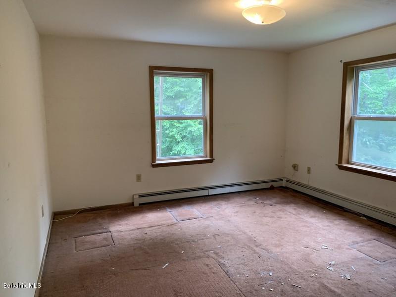 12 Quiet Knoll Road Stockbridge, MA 01266 - Photo 25 of 37 an empty room with a window