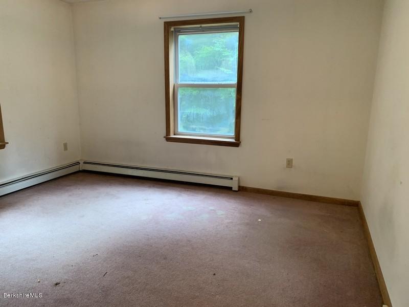12 Quiet Knoll Road Stockbridge, MA 01266 - Photo 26 of 37 an empty room with a window