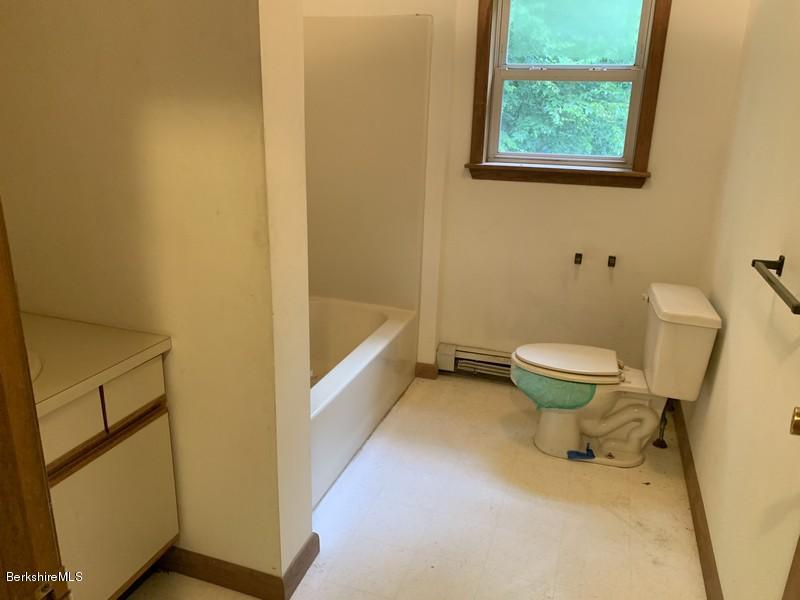 12 Quiet Knoll Road Stockbridge, MA 01266 - Photo 28 of 37 a bathroom with a toilet and a shower