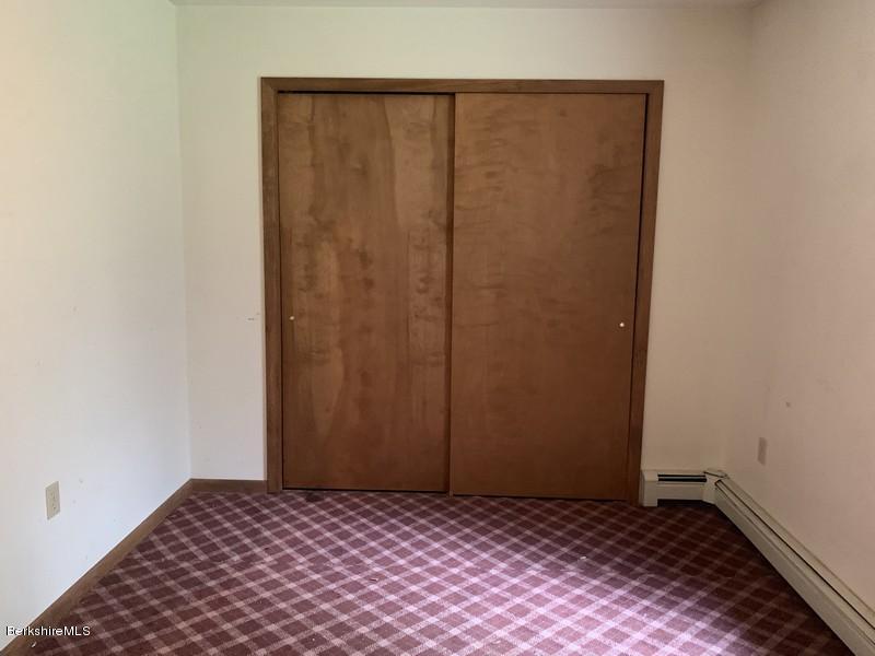 12 Quiet Knoll Road Stockbridge, MA 01266 - Photo 30 of 37 a view of a room with a wooden door