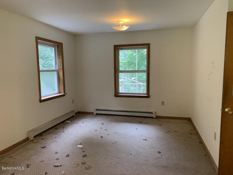 12 Quiet Knoll Road Stockbridge, MA 01266 - Photo 7 of 37 a view of an empty room with a window