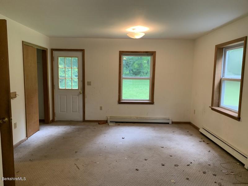 12 Quiet Knoll Road Stockbridge, MA 01266 - Photo 8 of 37 an empty room with windows