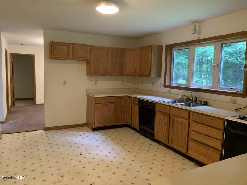 12 Quiet Knoll Road Stockbridge, MA 01266 - Photo 10 of 37 a kitchen with a sink cabinets and window