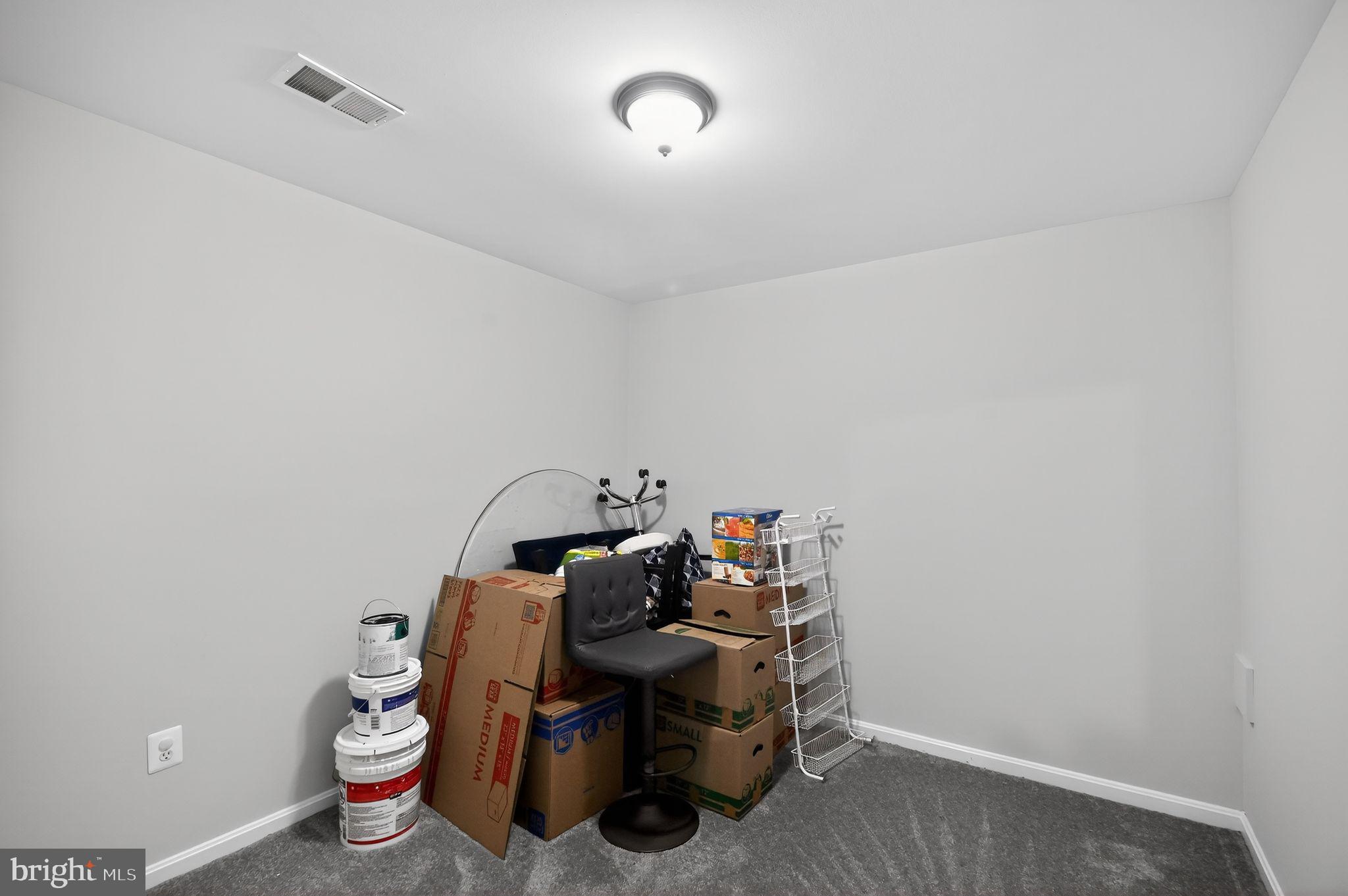 17326 Sligo Loop Dumfries, VA 22026 - Photo 18 of 34 a view of a workspace with wooden floor