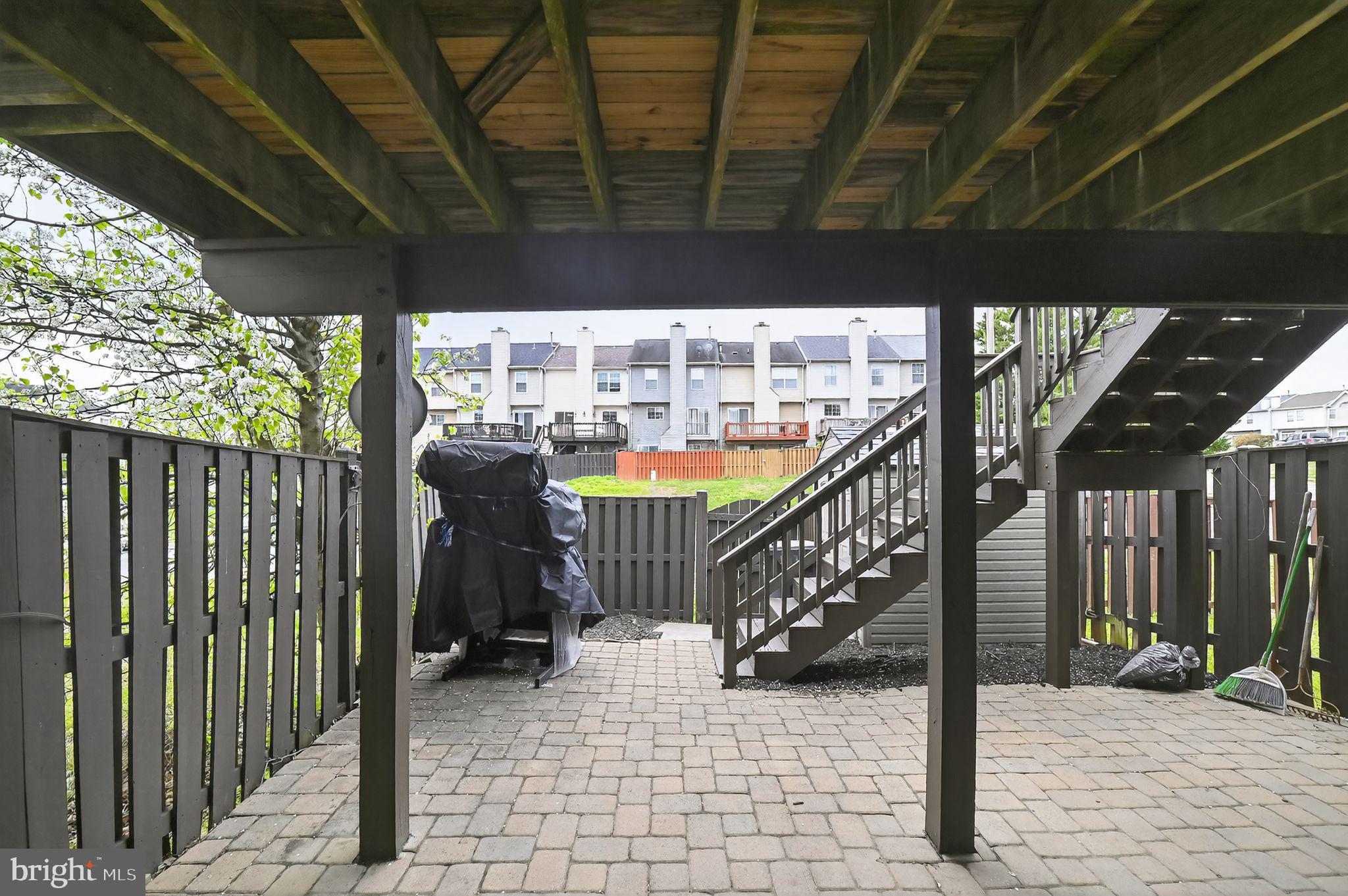 17326 Sligo Loop Dumfries, VA 22026 - Photo 2 of 34 a view of a porch with wooden floor