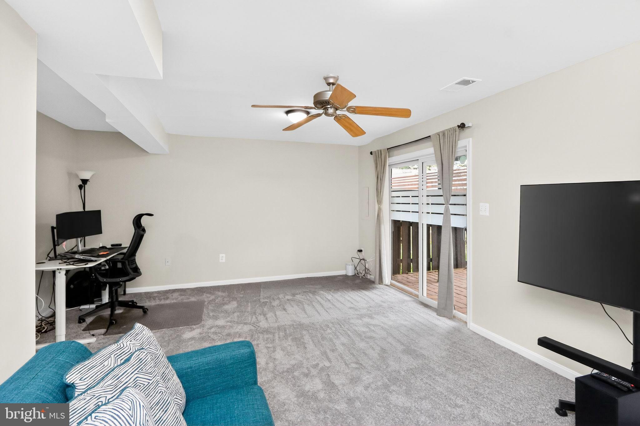 17326 Sligo Loop Dumfries, VA 22026 - Photo 10 of 34 a view of a livingroom with a workspace