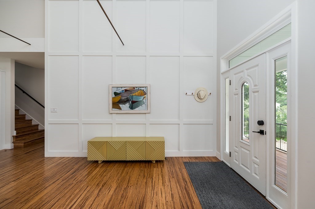 28 Grapevine Road Gloucester, MA 01930 - Photo 8 of 19 a view of a livingroom with wooden floor