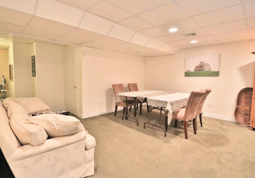 53 Lancaster Road, Unit 7 Clinton, MA 01510 - Photo 24 of 32 a view of a dining room with furniture