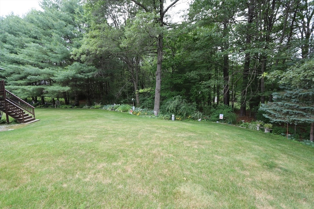 53 Lancaster Road, Unit 7 Clinton, MA 01510 - Photo 5 of 32 a view of outdoor space with deck and yard