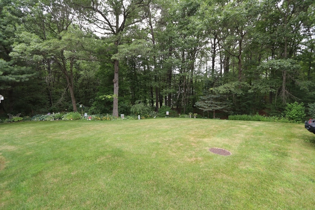 53 Lancaster Road, Unit 7 Clinton, MA 01510 - Photo 6 of 32 a view of outdoor space with deck and yard