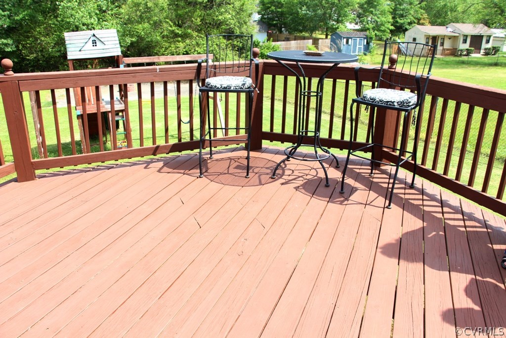 9617 Precedent Road Chesterfield, VA 23832 - Photo 4 of 22 a view of balcony with wooden floor and outdoor seating