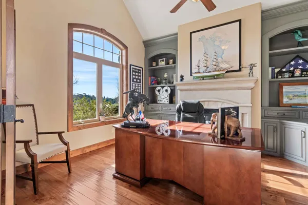 a kitchen with a stove and cabinets