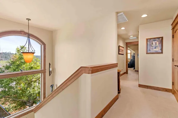 a view of a patio with a table and chairs