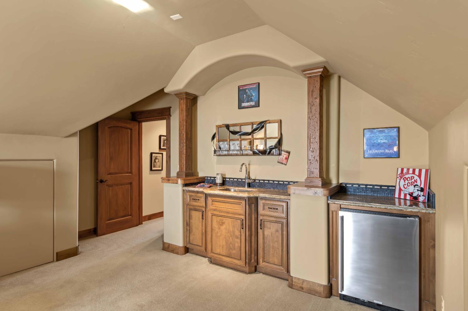 5390 Lost Creek Road Shingle Springs, CA 95682 - Photo 37 of 81 Family room wet bar with sink and refrigerator.